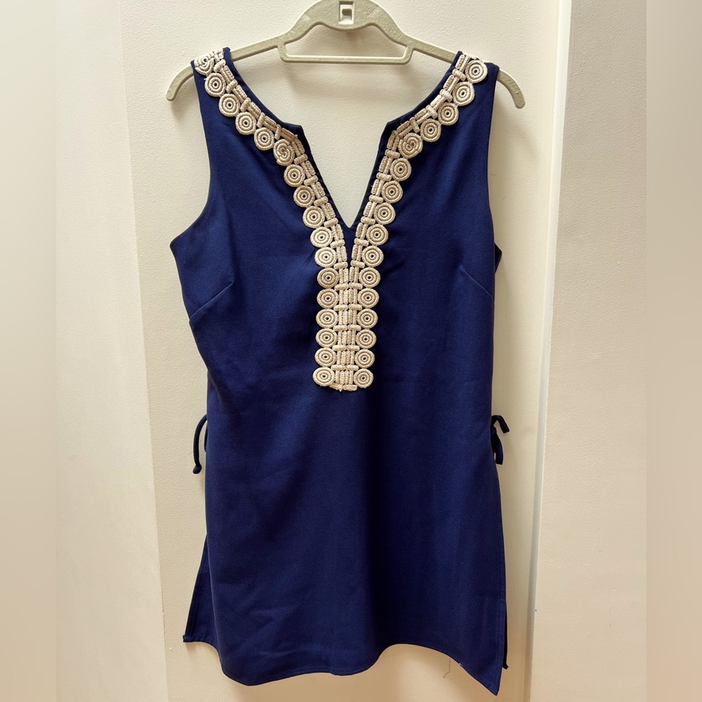 Lilly Pulitzer navy blue, crepe romper with gold embroidered detail. Size 4.